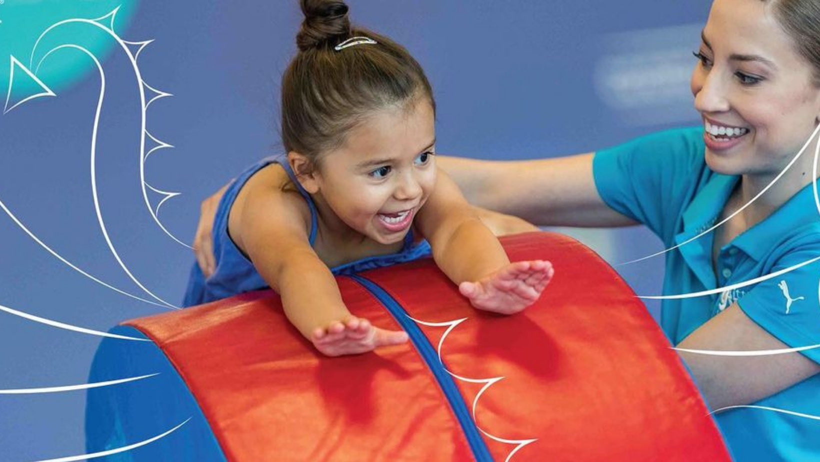 Criança fazendo ginástica no ginásio da The Little Gym